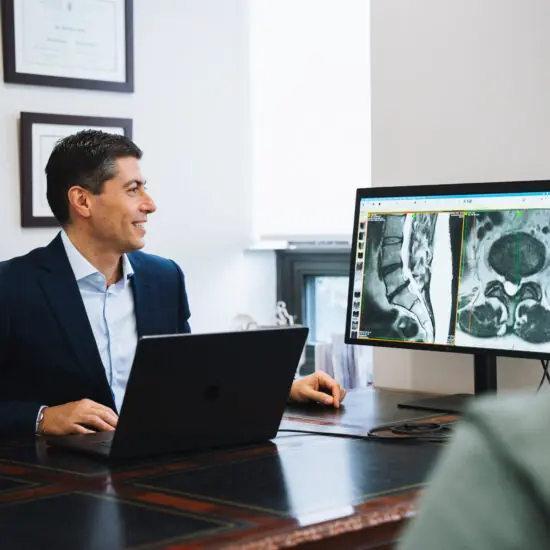 Dr. Jeff Golan reviewing spinal MRI imaging
